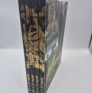 Harry Potter First four editions of the film Illustrated Box Set. Gold Accents